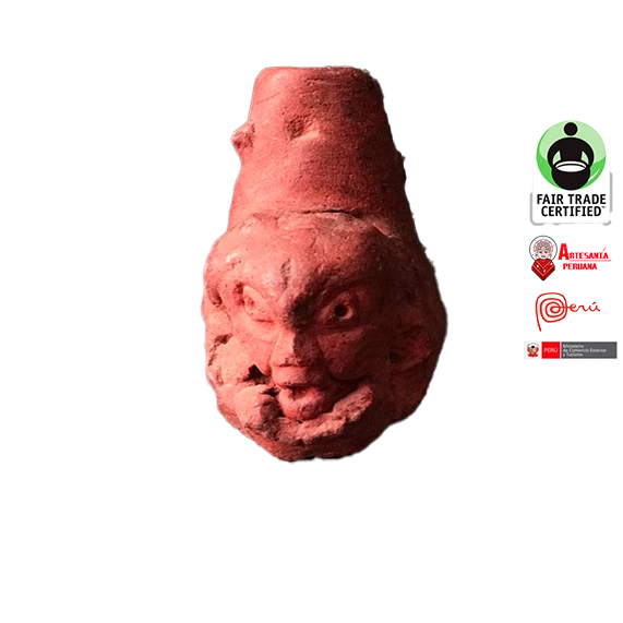 Artefacto de barro peruano precolombino con cara tallada